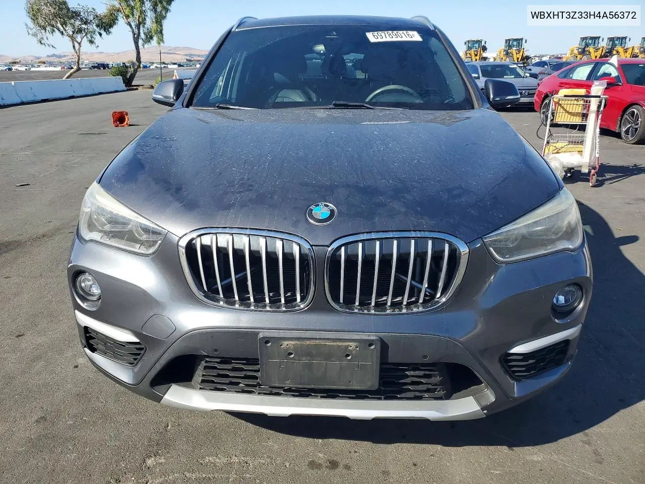 2017 BMW X1 VIN WBXHT3Z33H4A56372 — фото 5