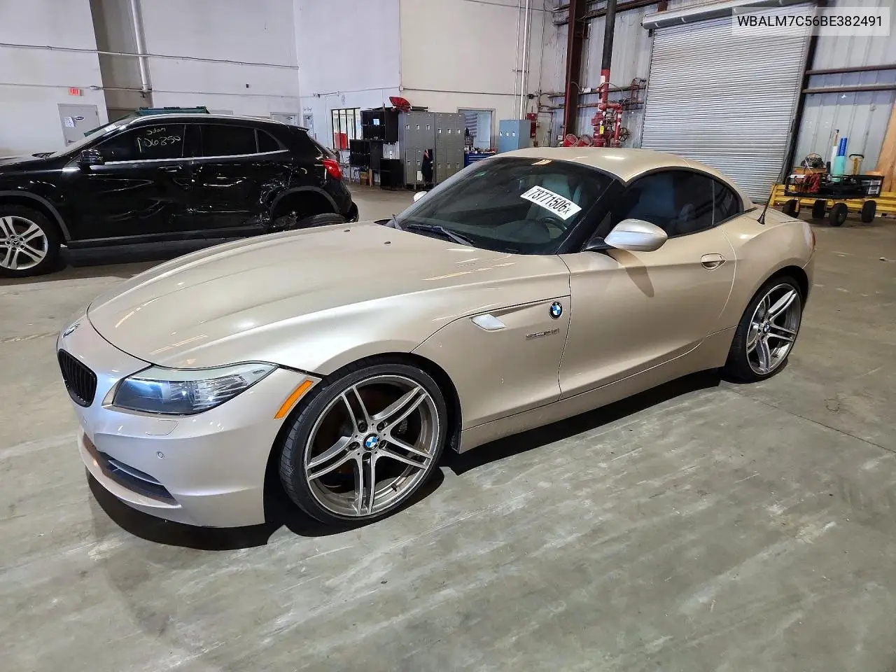 BMW Z4 2011, VIN WBALM7C56BE382491