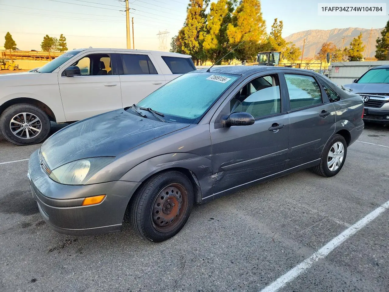 FORD FOCUS 2004, VIN 1FAFP34Z74W104784