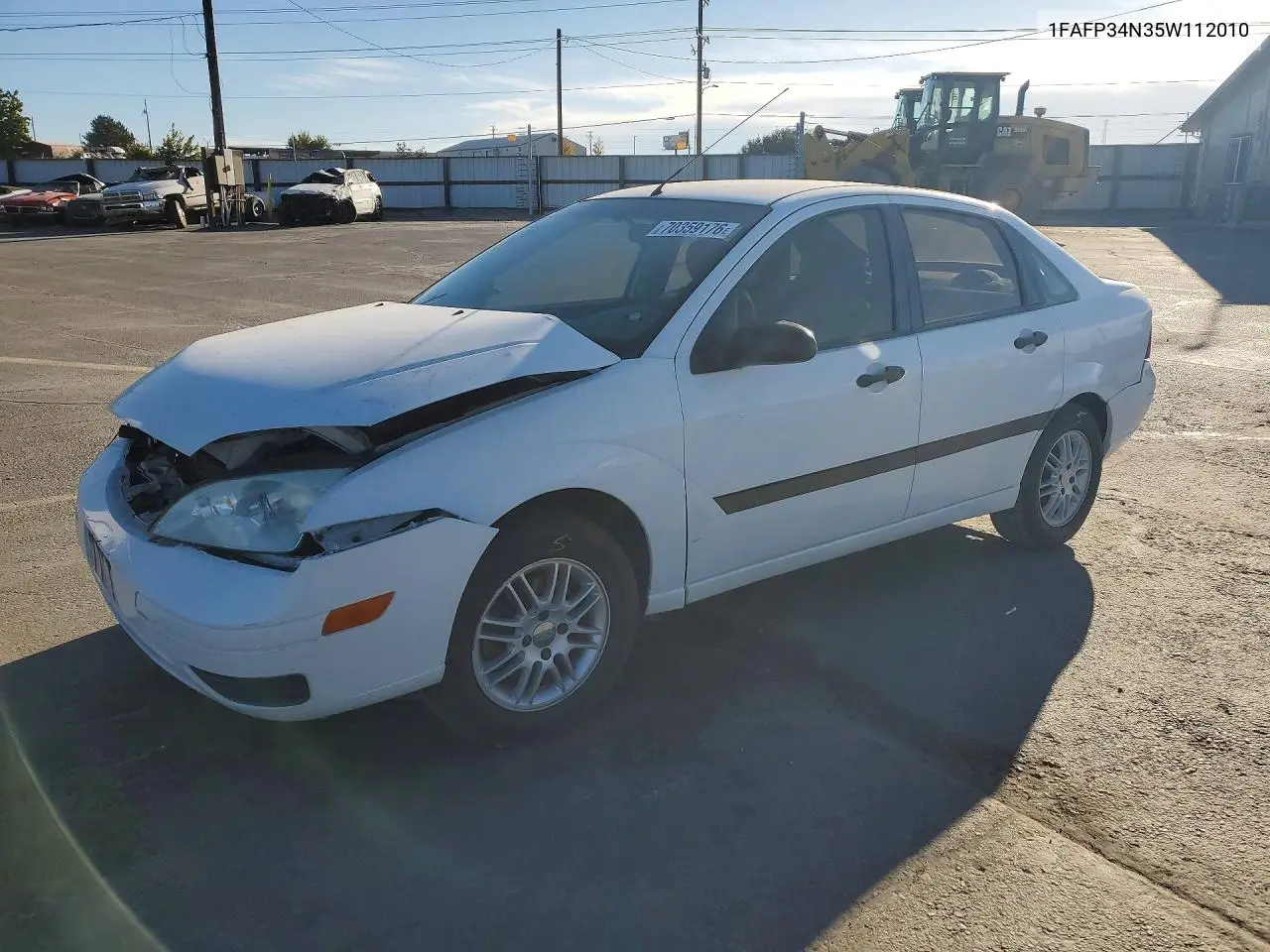 FORD FOCUS 2005, VIN 1FAFP34N35W112010