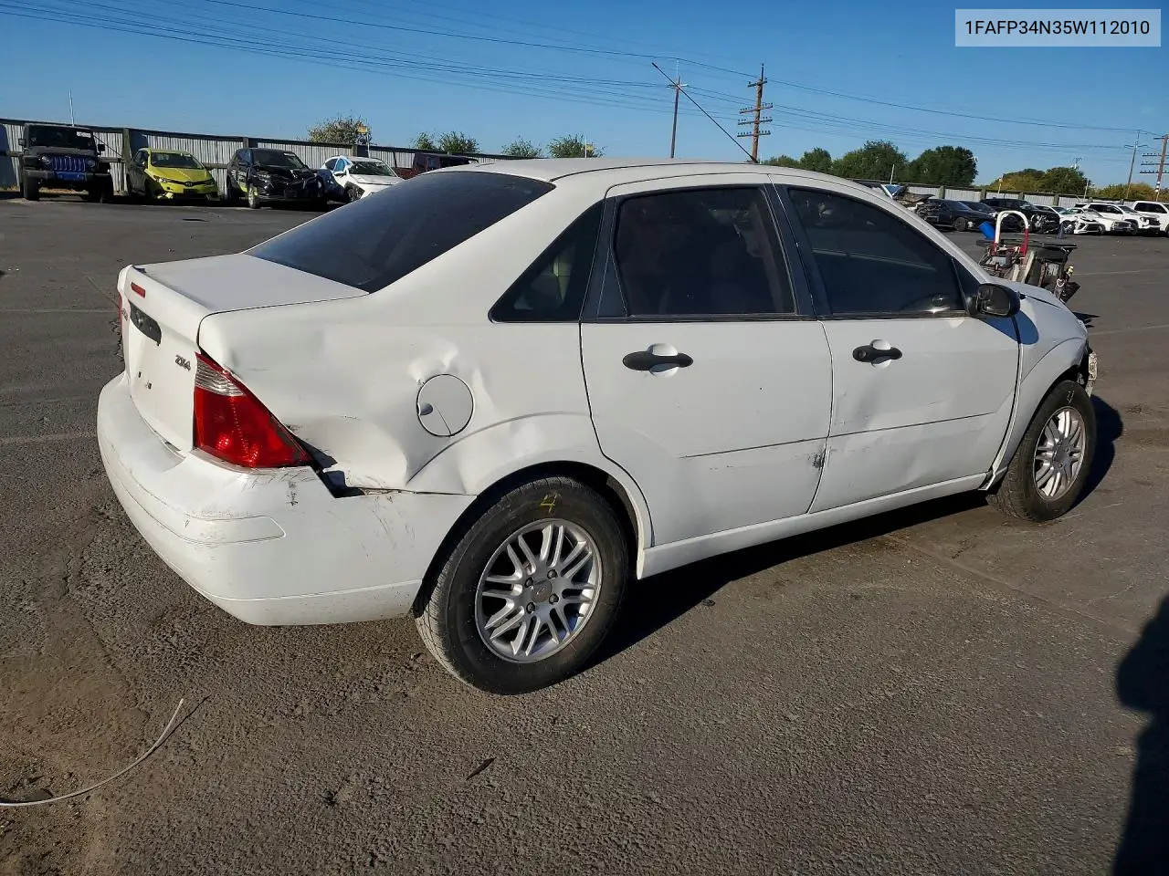 2005 FORD FOCUS VIN 1FAFP34N35W112010 — фото 3