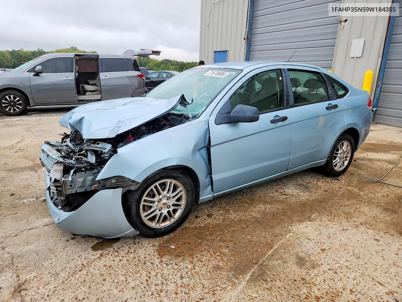 FORD FOCUS 2009, VIN 1FAHP35N59W184355