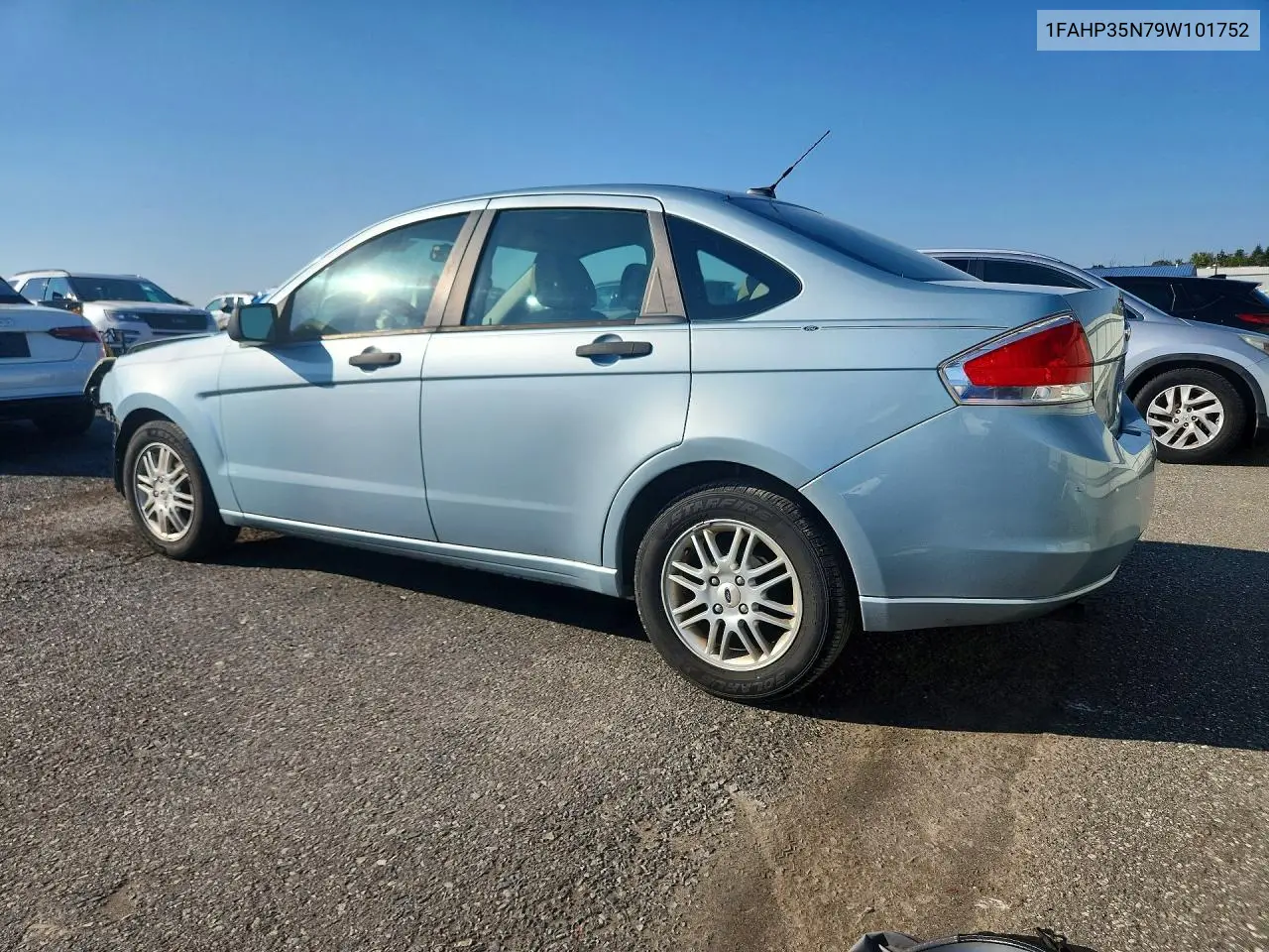 2009 FORD FOCUS VIN 1FAHP35N79W101752 — фото 2