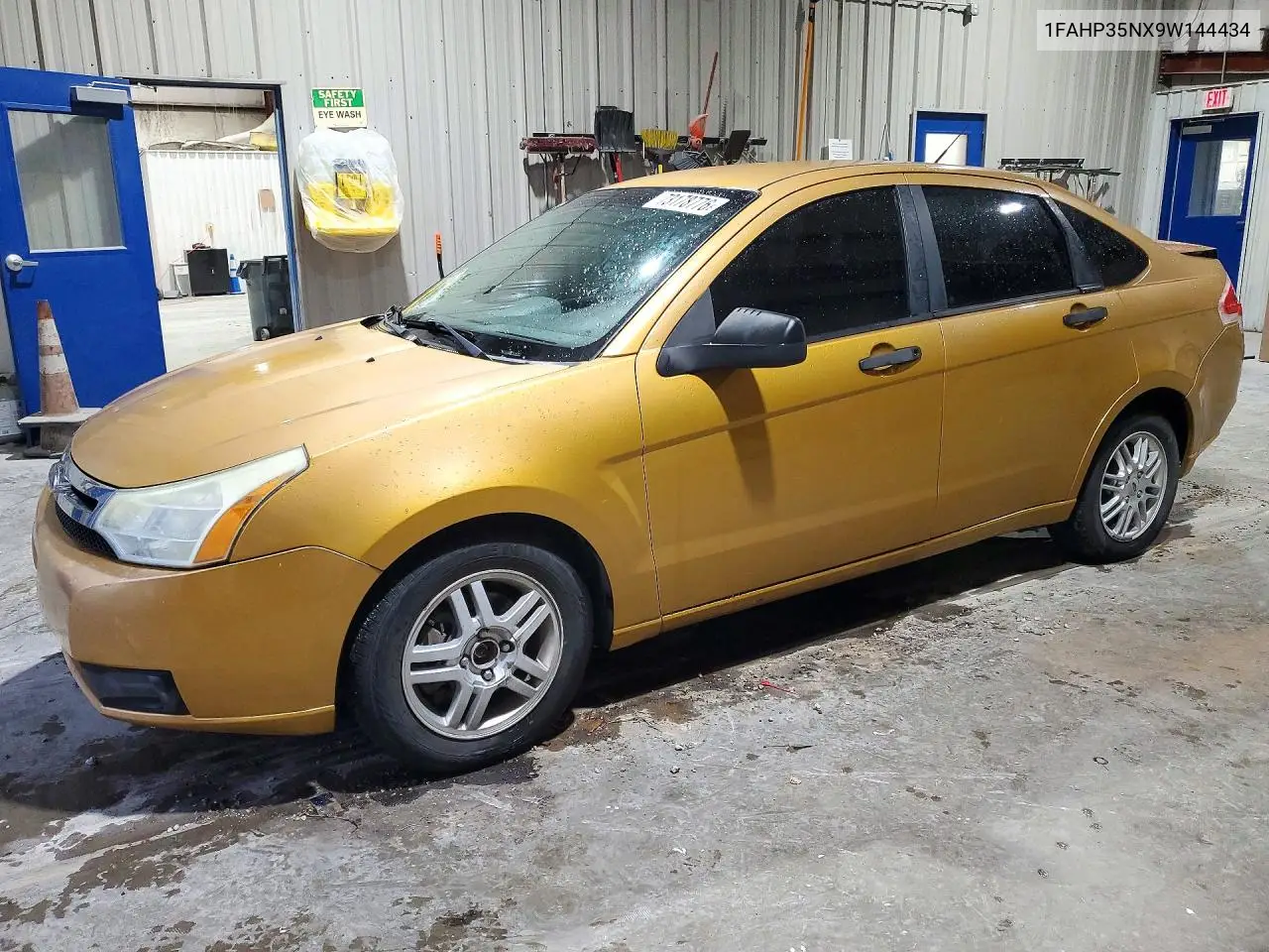 FORD FOCUS 2009, VIN 1FAHP35NX9W144434