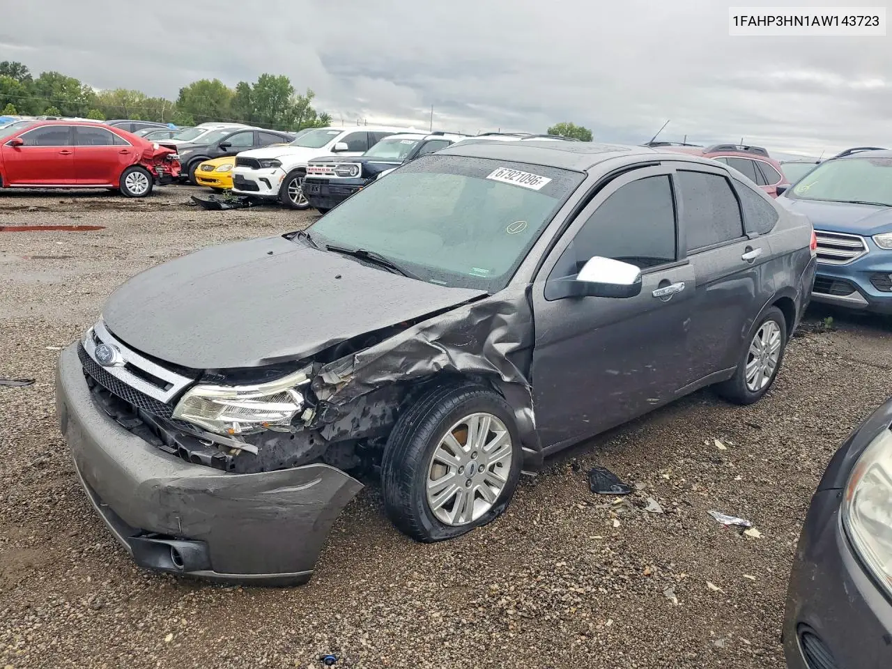 FORD FOCUS 2010, VIN 1FAHP3HN1AW143723