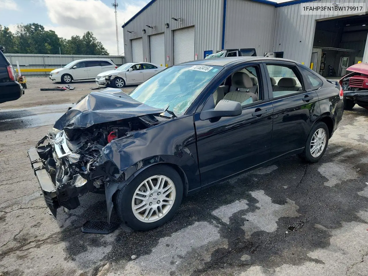 FORD FOCUS 2011, VIN 1FAHP3FN1BW179917