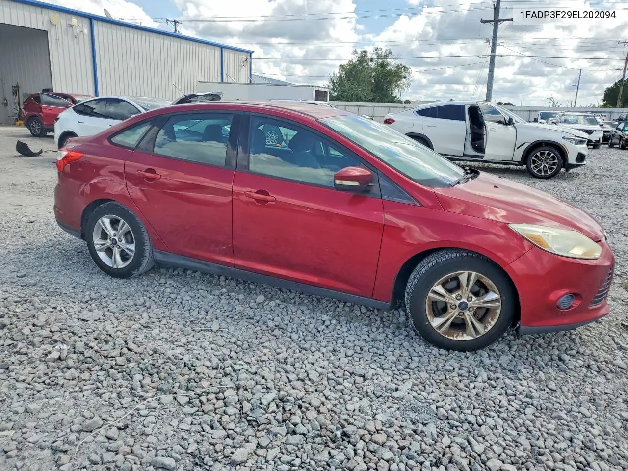 2014 FORD FOCUS VIN 1FADP3F29EL202094 — фото 4