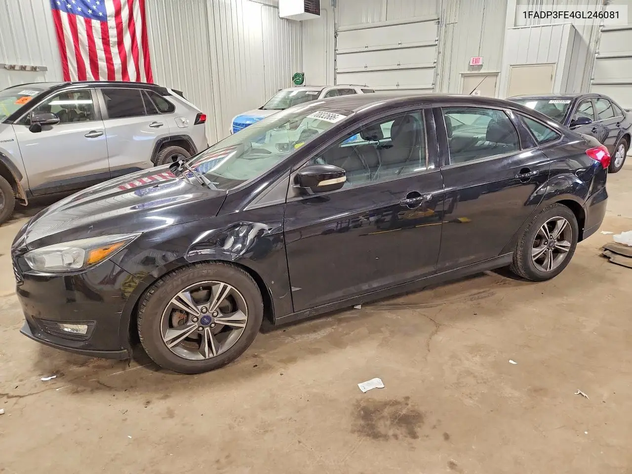 FORD FOCUS 2016, VIN 1FADP3FE4GL246081