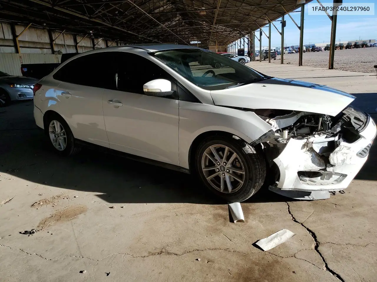 2016 FORD FOCUS VIN 1FADP3F24GL297960 — фото 4