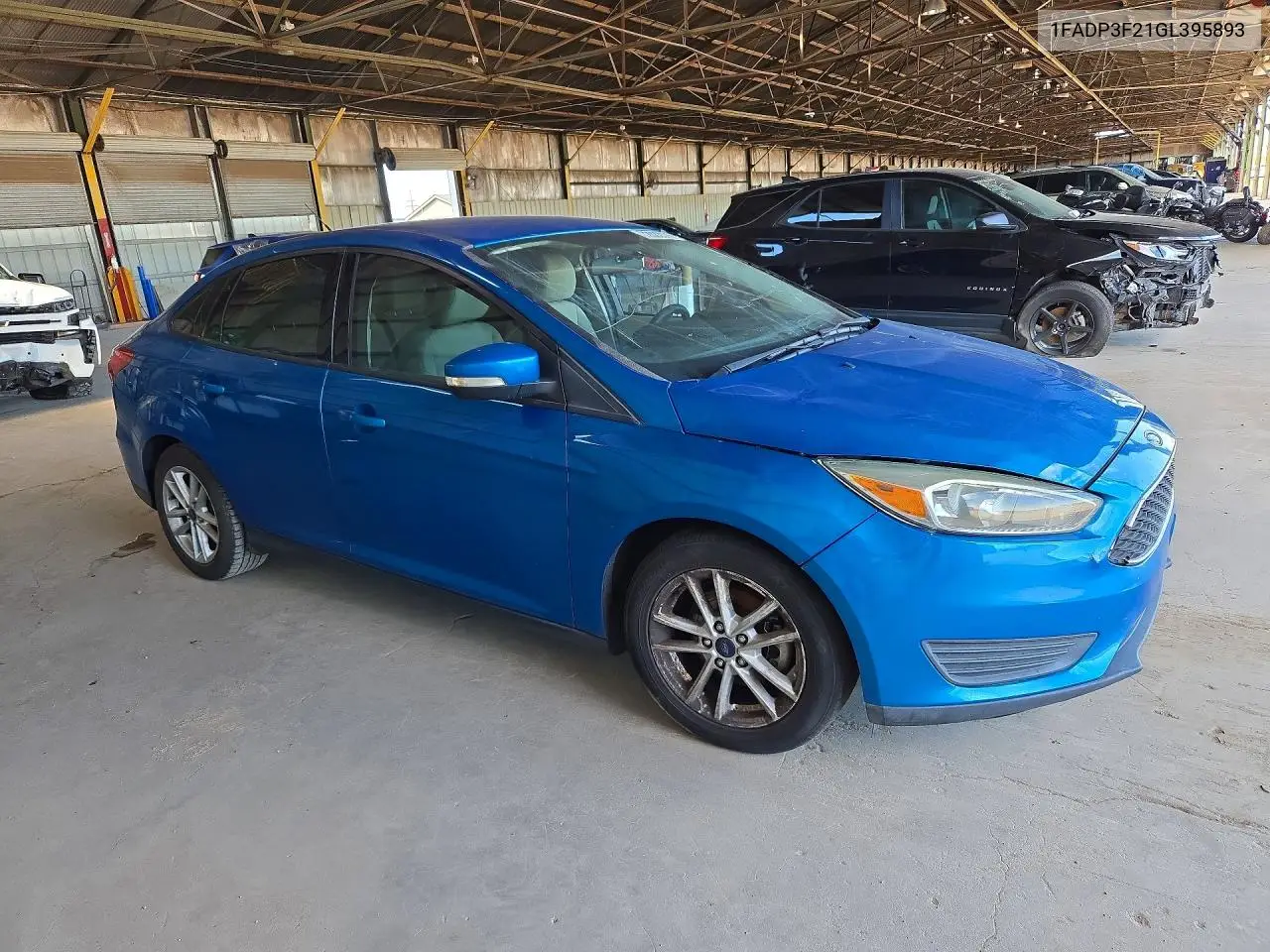 2016 FORD FOCUS VIN 1FADP3F21GL395893 — фото 4