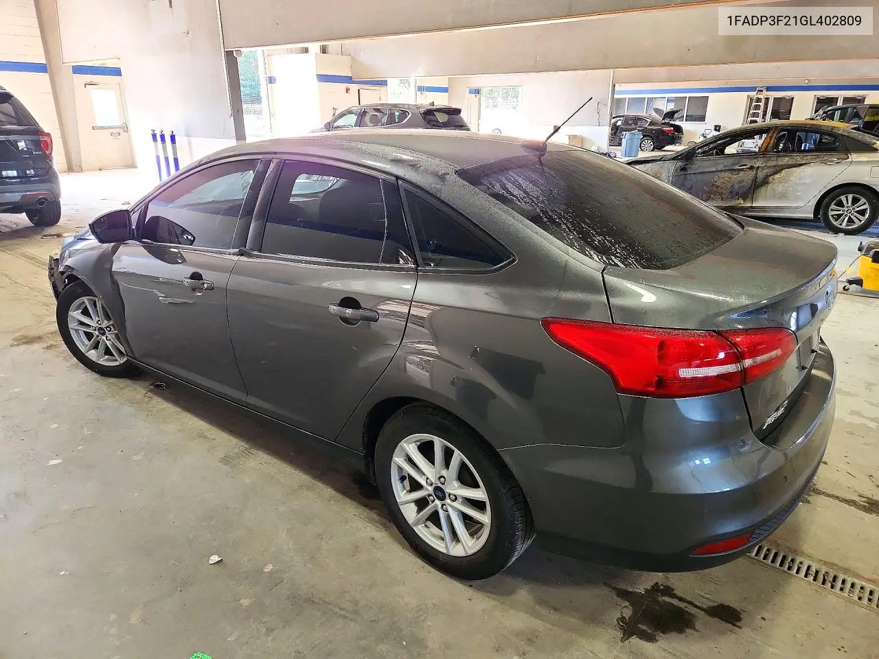 2016 FORD FOCUS VIN 1FADP3F21GL402809 — фото 2