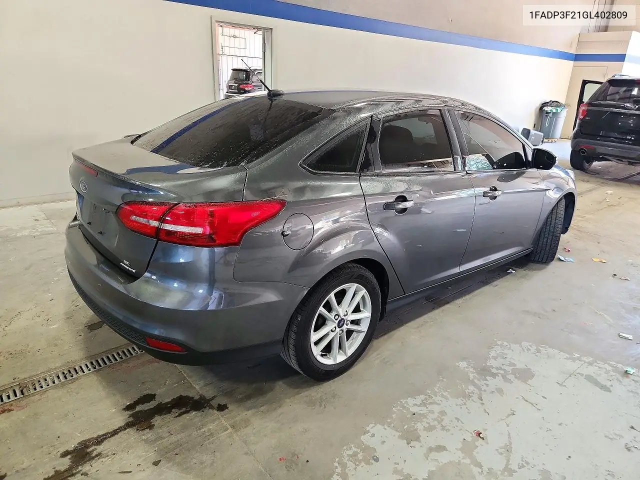 2016 FORD FOCUS VIN 1FADP3F21GL402809 — фото 3