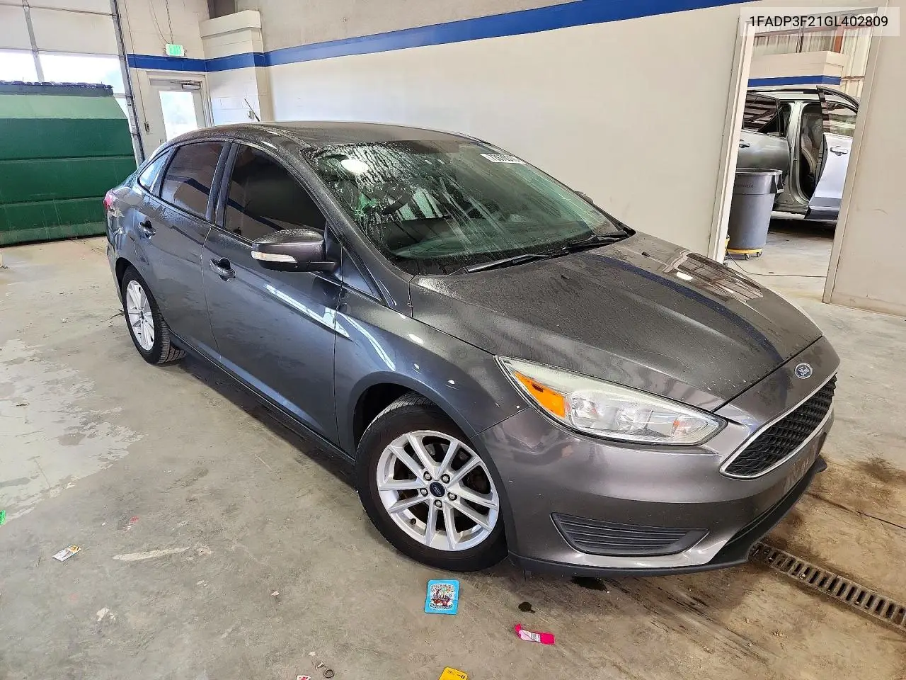 2016 FORD FOCUS VIN 1FADP3F21GL402809 — фото 4