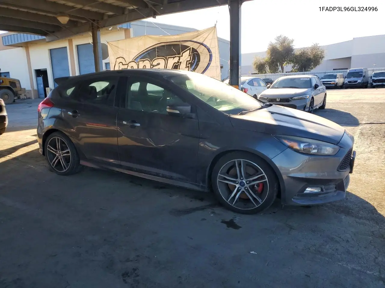 2016 FORD FOCUS VIN 1FADP3L96GL324996 — фото 4