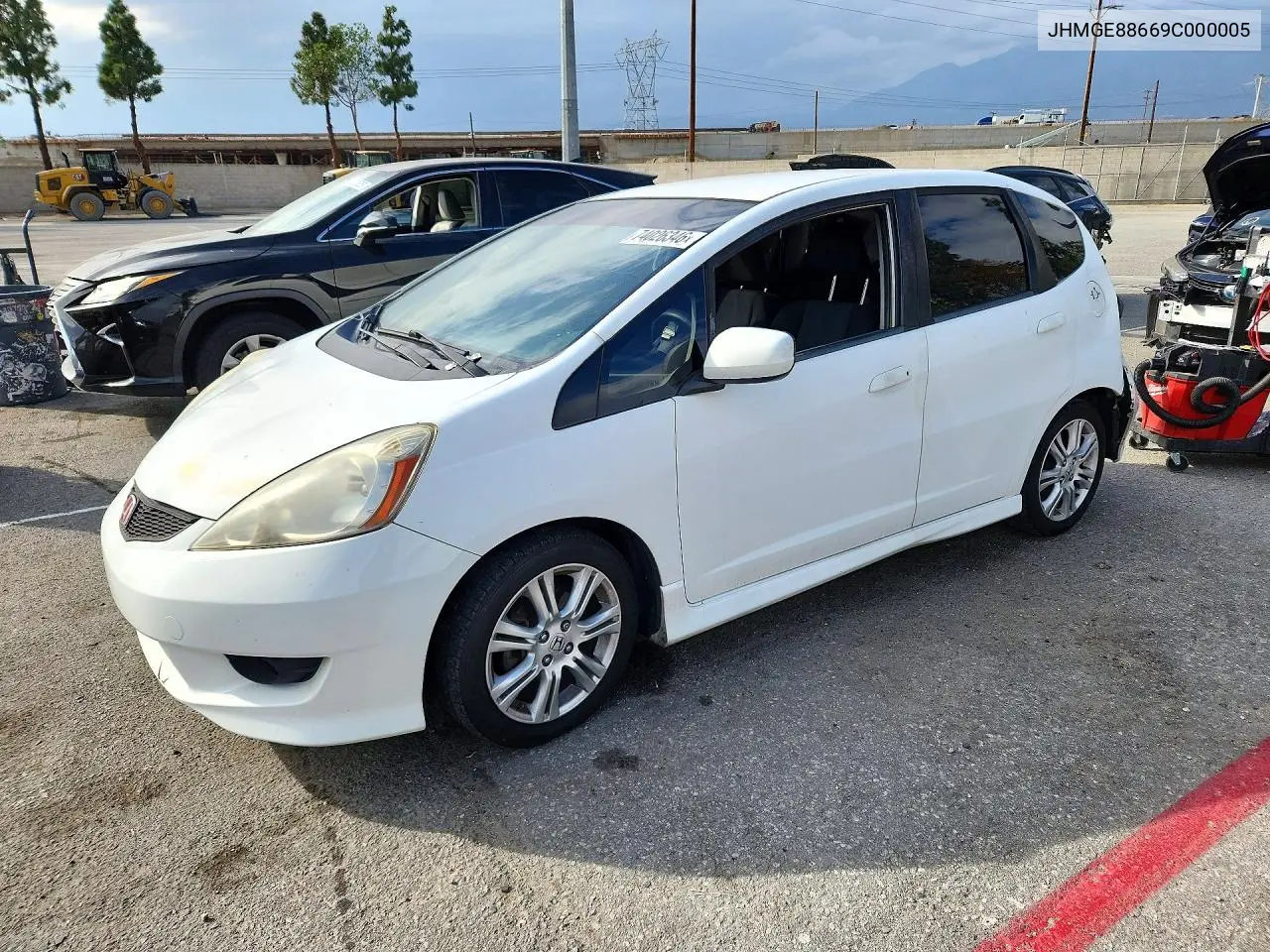 HONDA FIT 2009, VIN JHMGE88669C000005