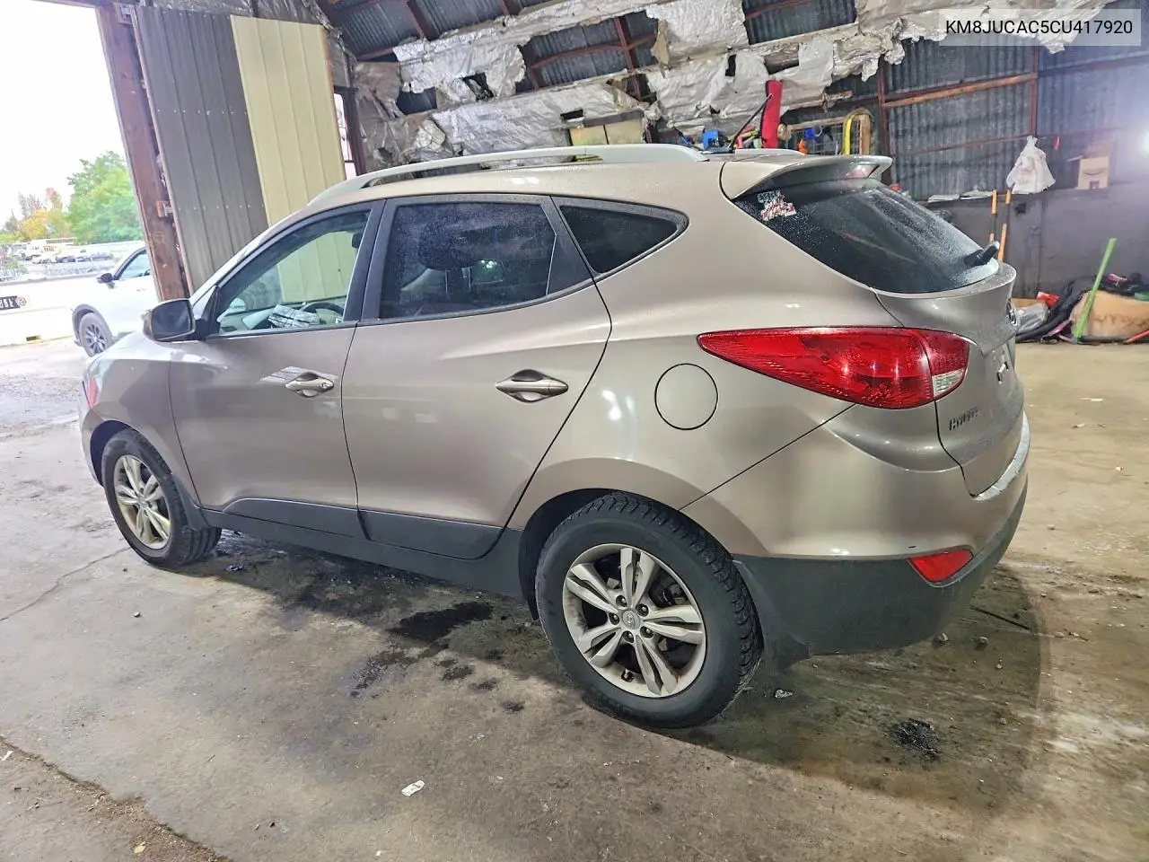 2012 HYUNDAI TUCSON VIN KM8JUCAC5CU417920 — фото 2