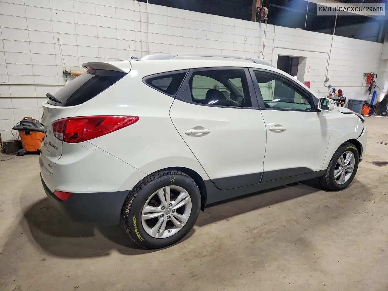 2012 HYUNDAI TUCSON VIN KM8JUCACXCU429688 — фото 3