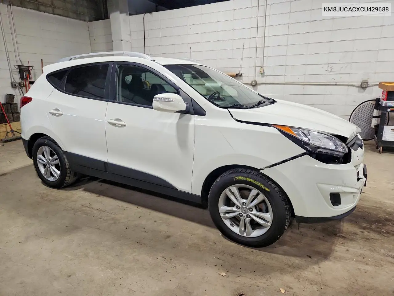 2012 HYUNDAI TUCSON VIN KM8JUCACXCU429688 — фото 4