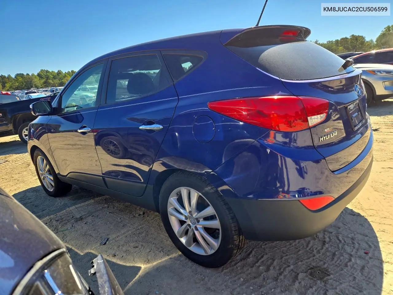2012 HYUNDAI TUCSON VIN KM8JUCAC2CU506599 — фото 2