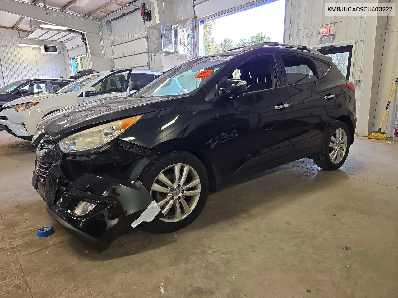 HYUNDAI TUCSON 2012, VIN KM8JUCAC9CU403227