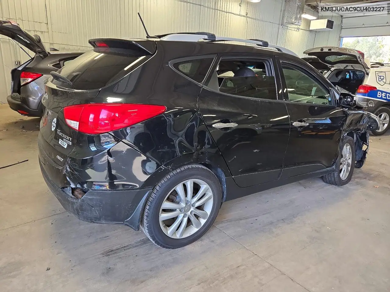 2012 HYUNDAI TUCSON VIN KM8JUCAC9CU403227 — фото 3