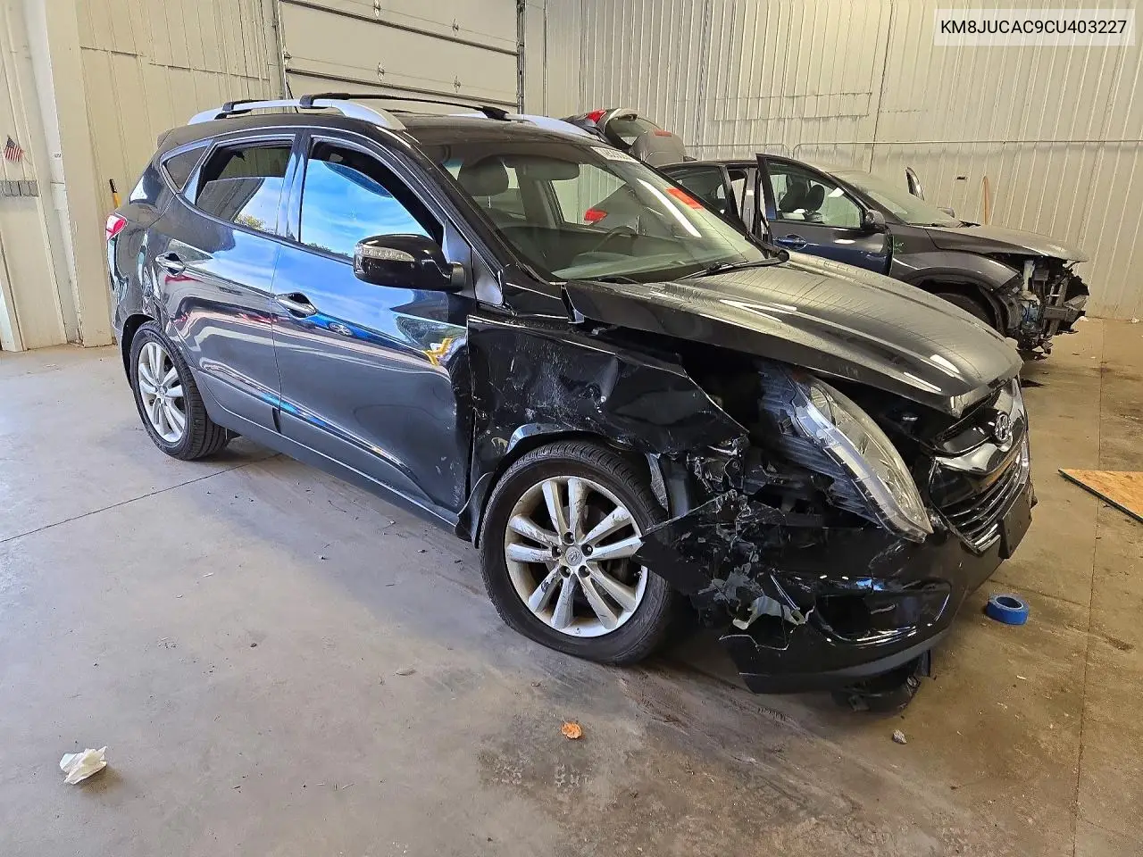 2012 HYUNDAI TUCSON VIN KM8JUCAC9CU403227 — фото 4