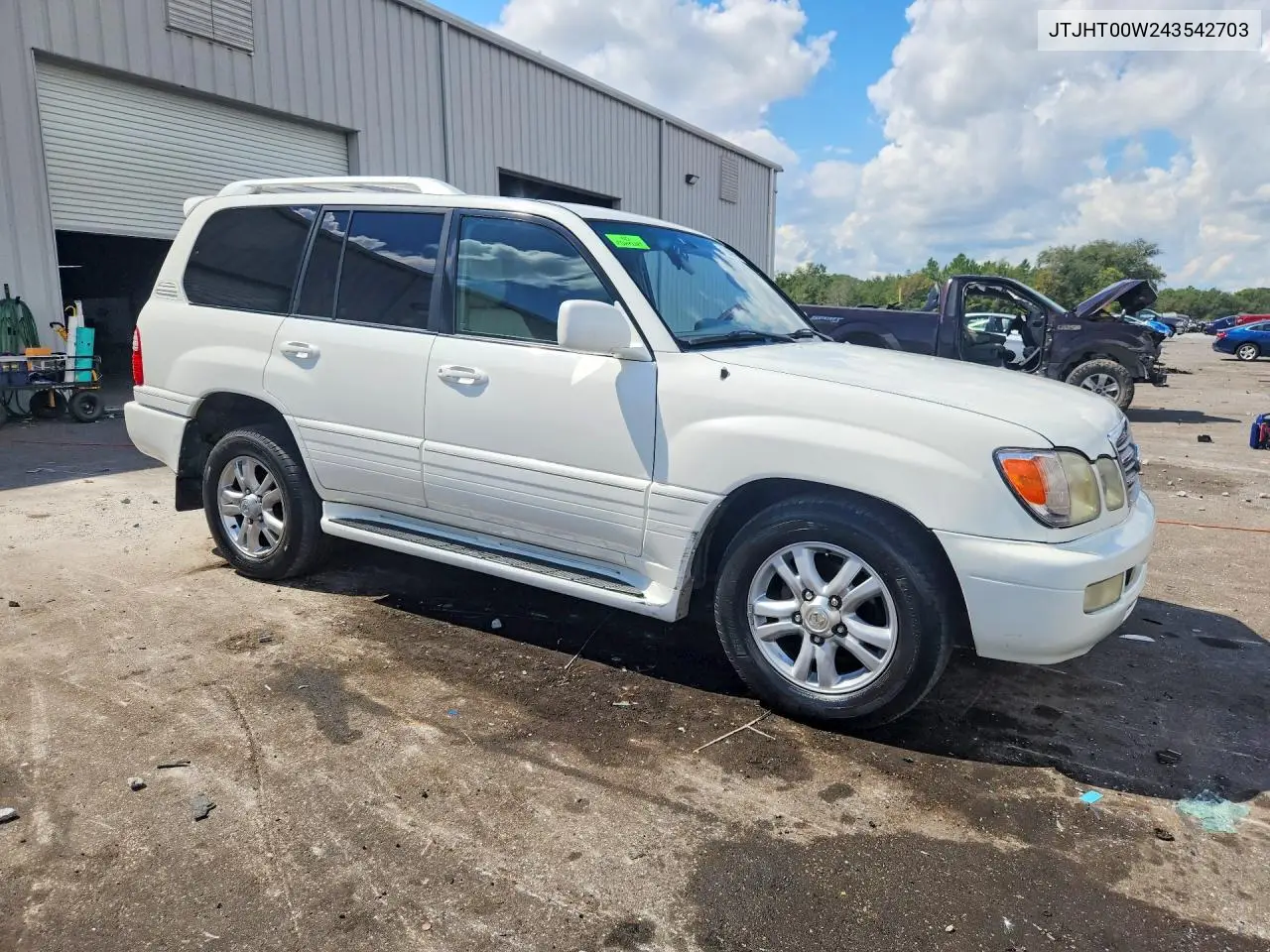 2004 LEXUS LX VIN JTJHT00W243542703 — фото 4