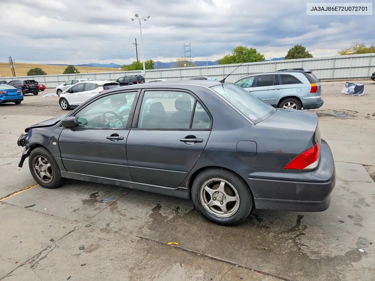2002 MITSUBISHI LANCER VIN JA3AJ86E72U072701 — фото 2