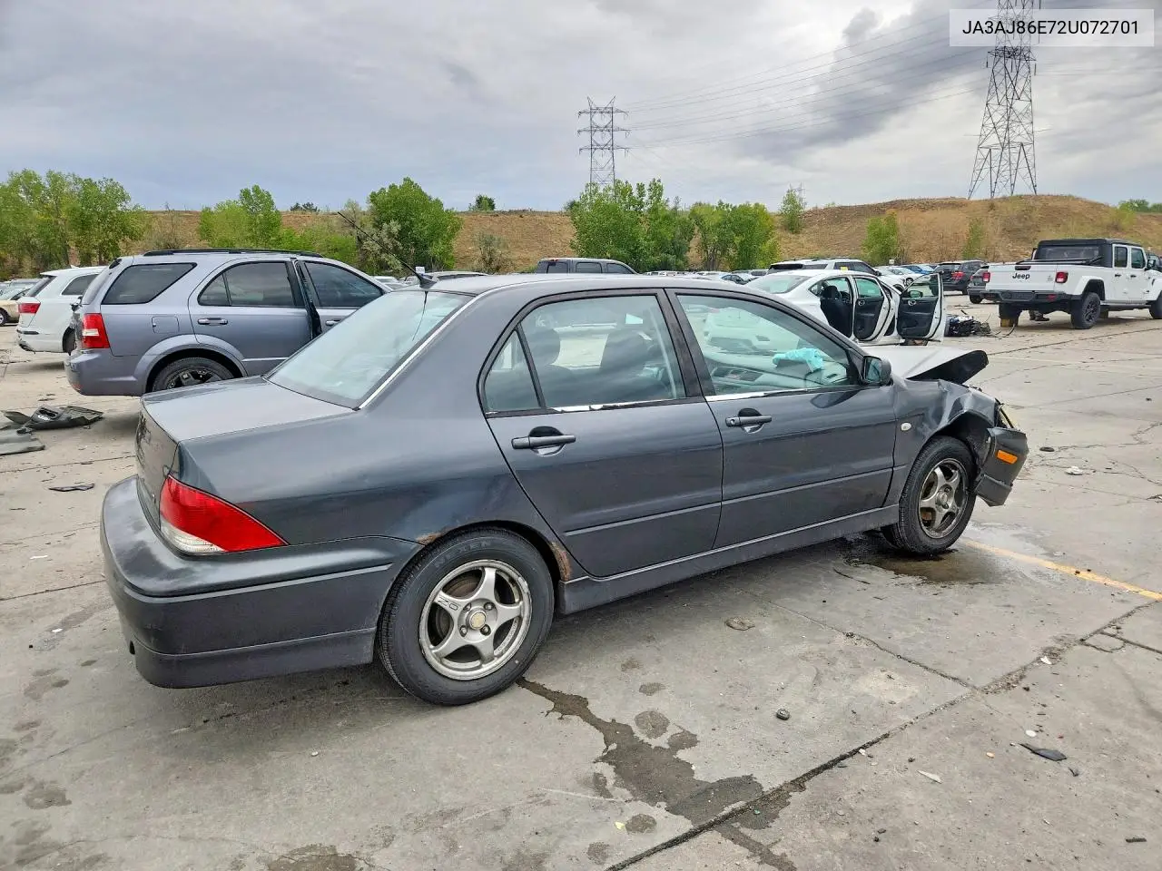 2002 MITSUBISHI LANCER VIN JA3AJ86E72U072701 — фото 3