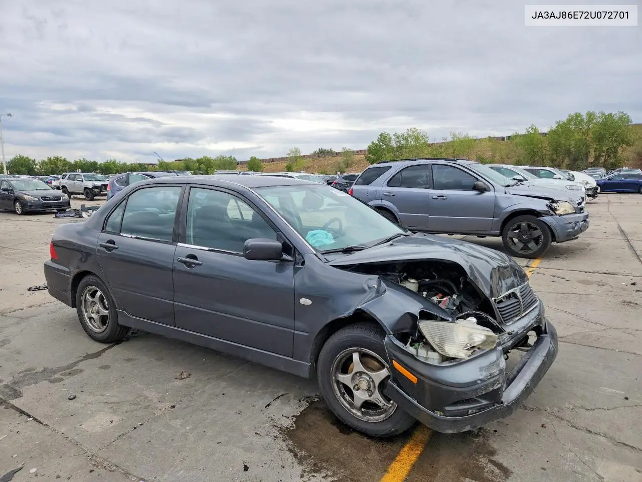 2002 MITSUBISHI LANCER VIN JA3AJ86E72U072701 — фото 4
