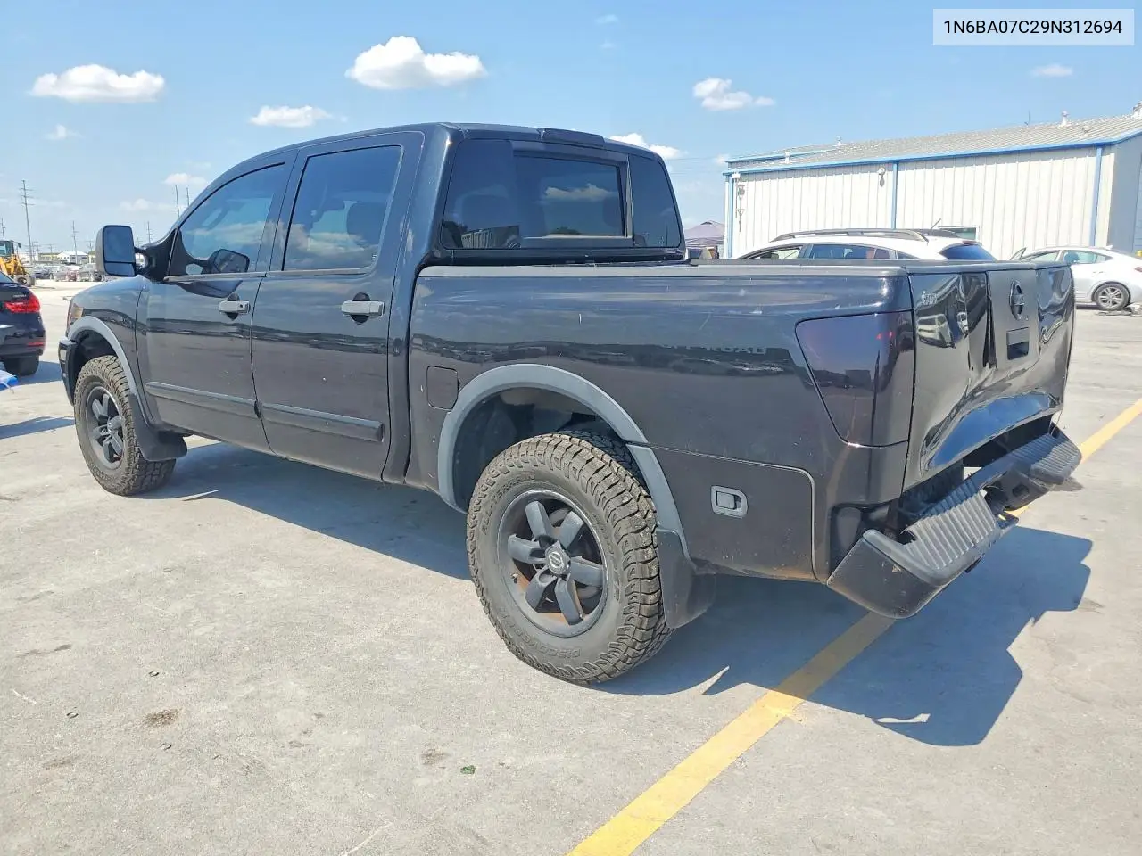 2009 NISSAN TITAN VIN 1N6BA07C29N312694 — фото 2