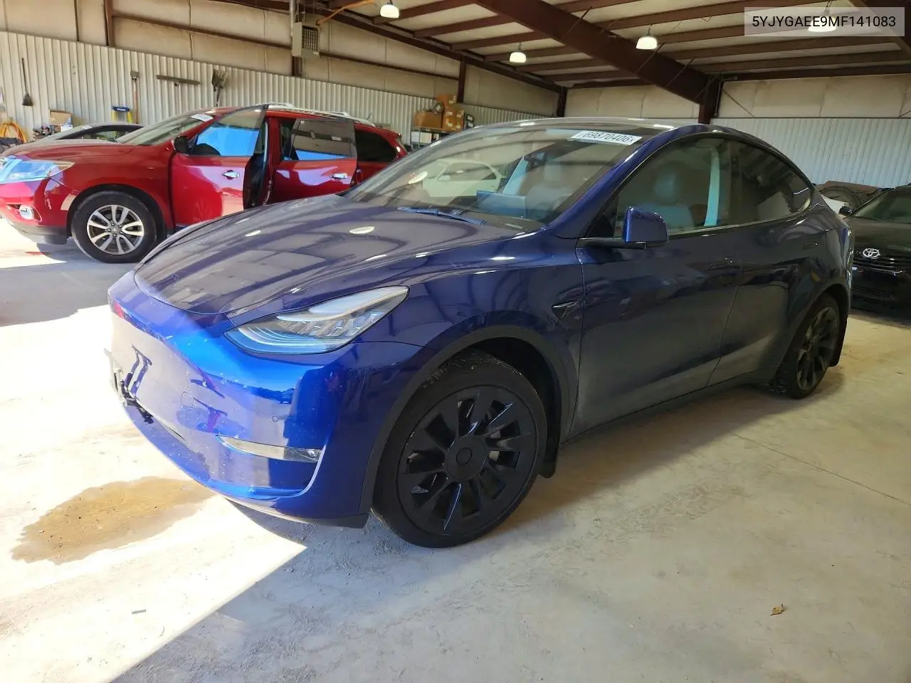 TESLA MODEL Y 2021, VIN 5YJYGAEE9MF141083