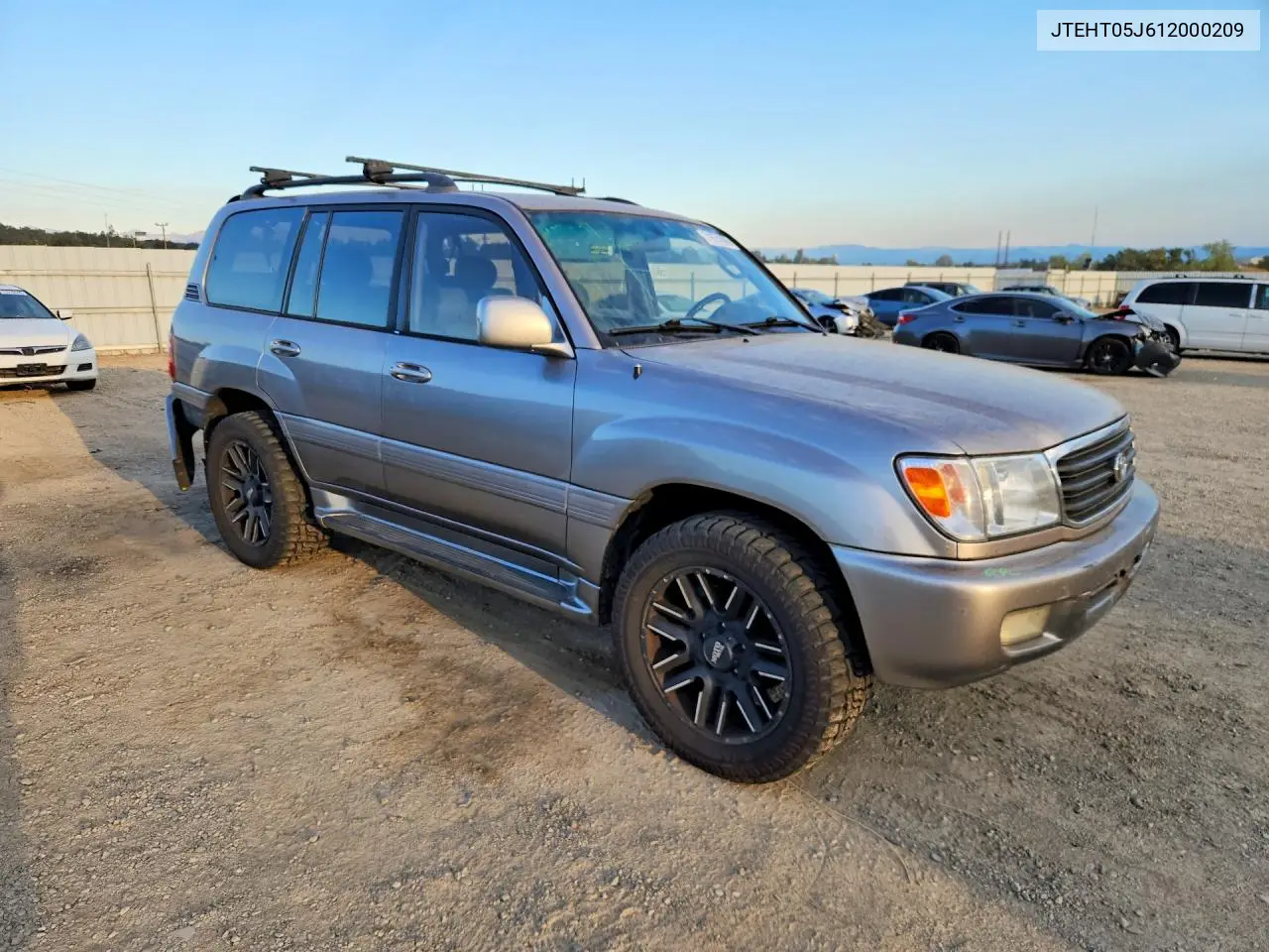 2001 TOYOTA LAND CRUISER VIN JTEHT05J612000209 — фото 4