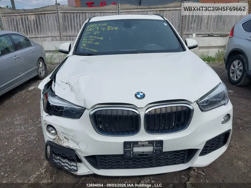 2017 BMW X1 VIN WBXHT3C39H5F69662 — фото 13