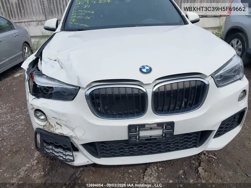 2017 BMW X1 VIN WBXHT3C39H5F69662 — фото 20