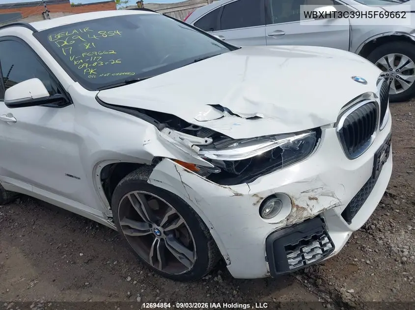2017 BMW X1 VIN WBXHT3C39H5F69662 — фото 6