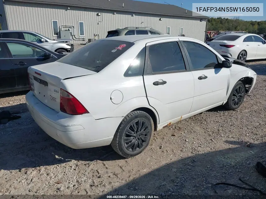 2005 FORD FOCUS VIN 1FAFP34N55W165050 — фото 4