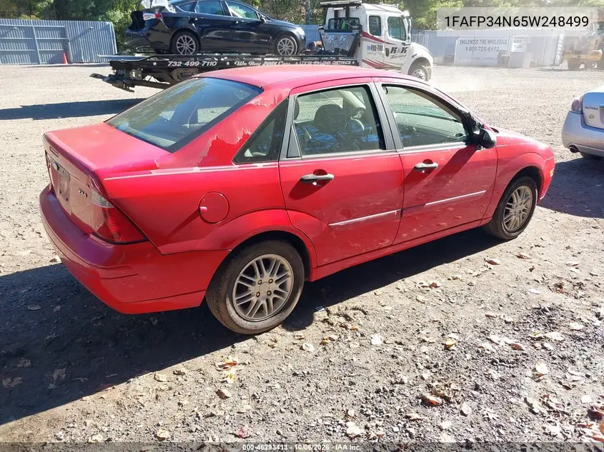 2005 FORD FOCUS VIN 1FAFP34N65W248499 — фото 4