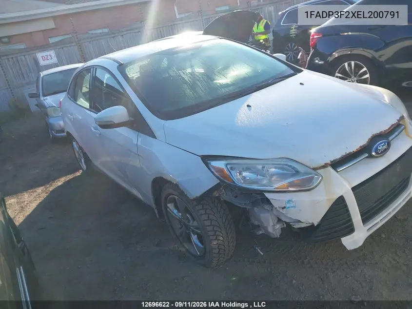 2014 FORD FOCUS VIN 1FADP3F2XEL200791 — фото 12