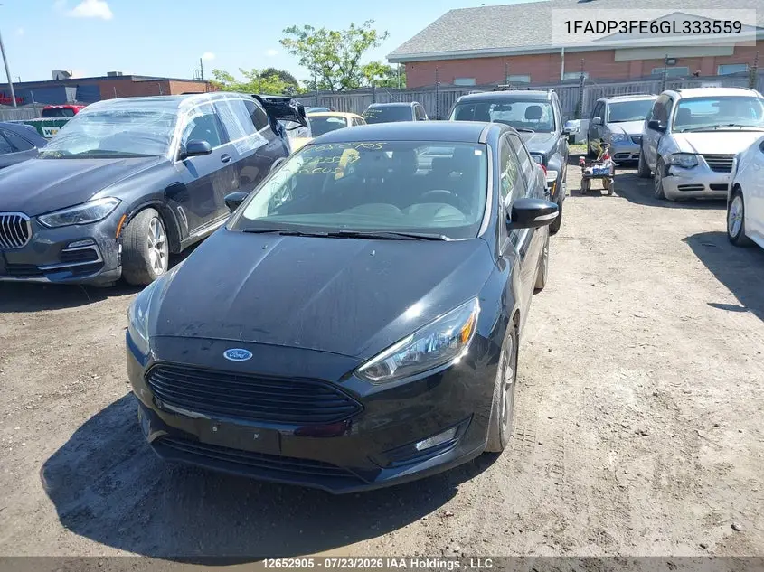 2016 FORD FOCUS VIN 1FADP3FE6GL333559 — фото 12