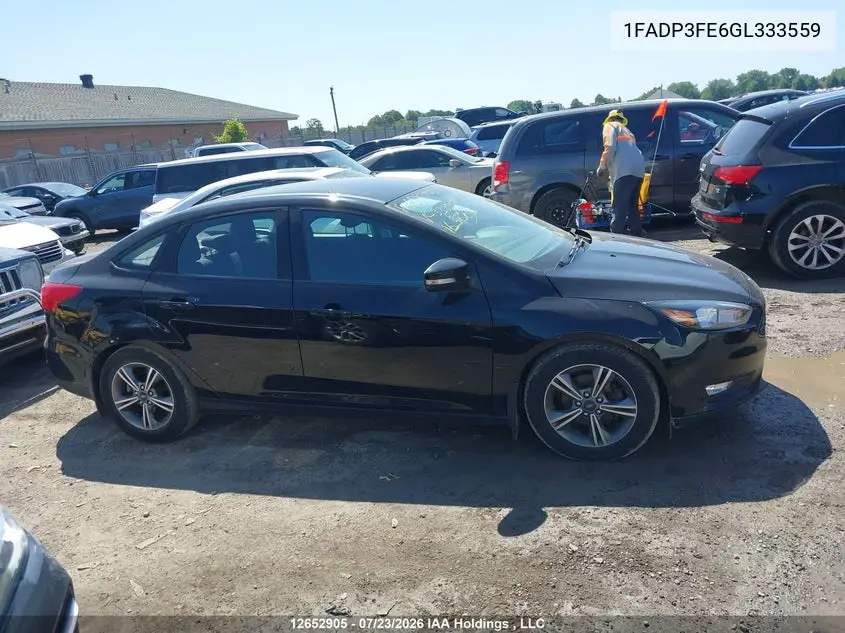 2016 FORD FOCUS VIN 1FADP3FE6GL333559 — фото 13