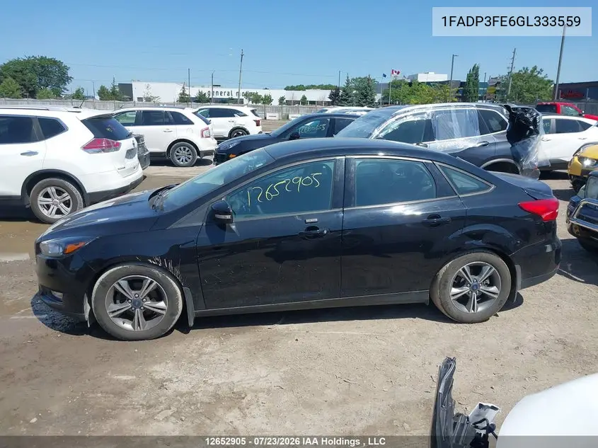 2016 FORD FOCUS VIN 1FADP3FE6GL333559 — фото 14
