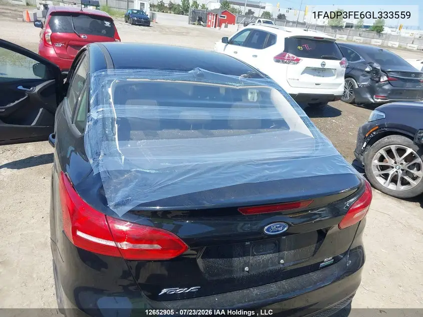 2016 FORD FOCUS VIN 1FADP3FE6GL333559 — фото 18
