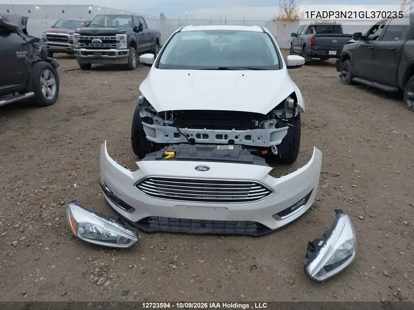 2016 FORD FOCUS VIN 1FADP3N21GL370235 — фото 12