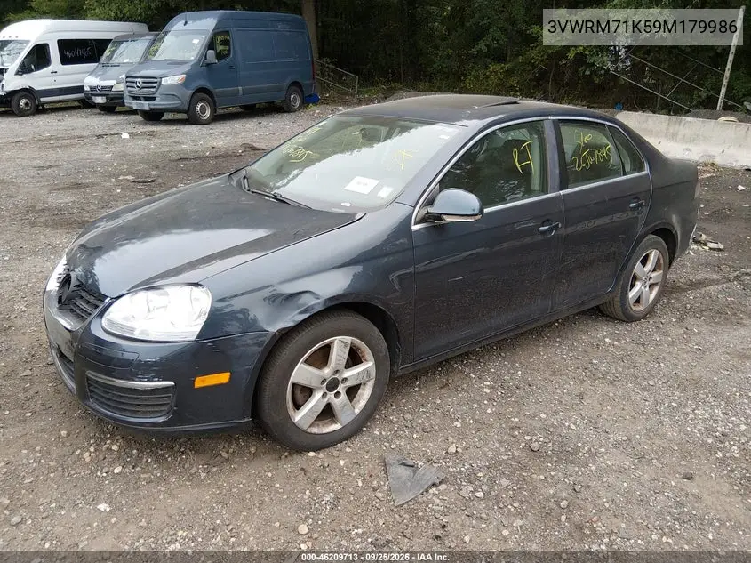 2009 VOLKSWAGEN JETTA VIN 3VWRM71K59M179986 — фото 2